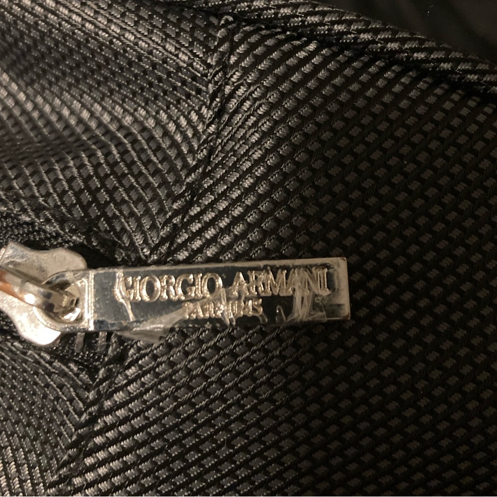 Giorgio Armani toiletry bag.